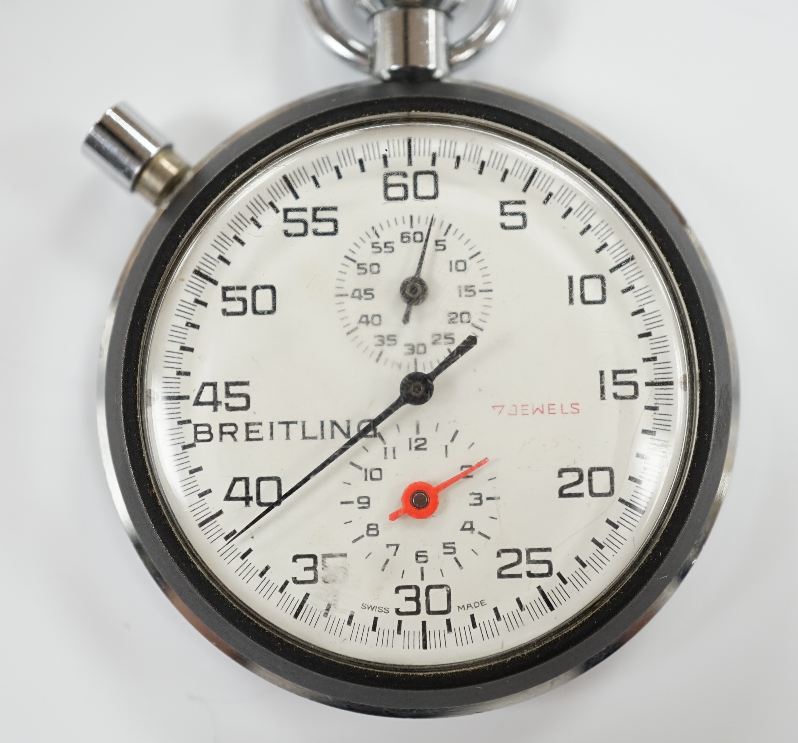 A base metal cased Breitling stop watch, case diameter 54mm.